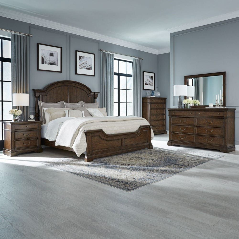 Liberty Furniture Arden Road poster bed, dresser, mirror, and nightstand in cherry styled in a gray bedroom